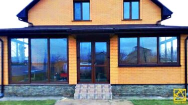 Паралельно-зсувні пластикові вікна - скління тераси з ламінуванням: фото #00874